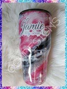 a pink and black tumbler cup with the name jamie my sweet days on it