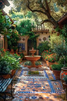 an outdoor garden with potted plants and a fountain