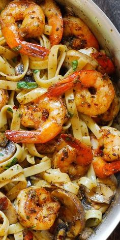 pasta with shrimp and mushrooms in a pan