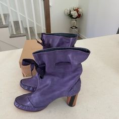 I'm Helping My Aunt Declutter Her Shoe Collection She Compiled Over 30 Years Living In London. I'm A 33 Year Old Male With No Sense Of Fashion So My Descriptions/Pricing Are Probably Off. These Are Violet Leather Boots By Georgina Goodman, A London Based Designer Who Shut Down In 2011. Size 41 Eu. Lightly Worn. Please Message Me For More Pictures/Info! -Devon Purple Leather Spring Boots, Spring Purple Leather Boots, Casual Purple Leather Heels, Designer Boots With Sculpted Heel For Spring, Designer Spring Boots With Leather Sole, Luxury Leather Sole Boots For Spring, Designer Square Toe Spring Boots, Purple Leather Heeled Boots For Fall, Fall Purple Leather Heeled Boots