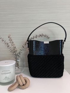 Black Crochet & Leather Bucket Bag - Handmade Statement Accessory This stunning black bucket bag blends the softness of handmade crochet with the sleek sophistication of leather, creating a unique accessory that's both stylish and functional. Featuring a structured leather top and comfortable top handle, this bag offers the perfect balance between casual elegance and modern chic. Key Features: Handcrafted crochet body combined with a luxurious leather top for a bold, stylish contrast. Spacious i Crochet Bucket Bag, Crochet Bodies, Black Bucket Bag, Fall Bags, Bucket Purse, Crochet Bucket, Black Bucket, Idea Gift, Leather Bucket Bag