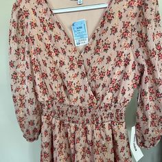 Teen Dress Size M Nwt Pink Floral With Gold Accent Casual Peach Mini Dress With Floral Print, Casual Peach Mini Dress For Spring, Casual Pink Long Sleeve Mini Dress, Casual Pink Mini Dress For Spring, Casual Pink V-neck Mini Dress, Casual Peach Dress For Spring, Teen Dress, Gold Accent, Pink Gold