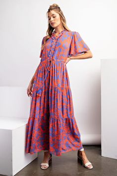 Introducing the Eleanor Maxi Dress! This flowy rayon gauze dress features a playful floral print, adjustable waist tassel tie, and pockets for the perfect blend of comfort and style. With notched neckline, ruffled details, and wing sleeves, this dress is both relaxed and elegant. Get ready to make a statement! Wing Sleeves, Notched Neckline, Gauze Dress, Coastal Chic, Kimono Jacket, Romper With Skirt, Outerwear Sweater, Romper Pants, Matching Dresses