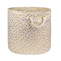 a white and gold polka dot storage bag