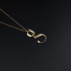 Gold Lowercase g necklace Designed by Moshik Nadav Typography with Paris Pro Typeface Modern Gold Monogram Initial Necklace, Luxury Yellow Gold Monogram Initial Necklace, Modern Gold Initial Necklace For Anniversary, Gold Monogram Initial Necklace For Formal Occasions, Gold Monogram Initial Necklace For Formal Events, Modern Yellow Gold Initial Necklace, Modern Gold Initial Necklace Gift, Elegant Tan Monogram Initial Necklace, Classic Gold Monogram Initial Necklace