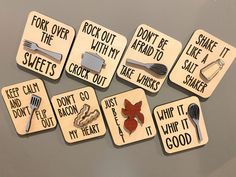 six wooden signs with different types of cooking utensils and words written on them