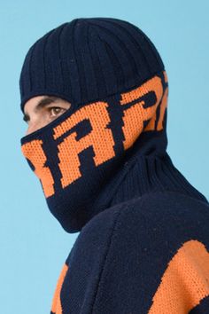 Protect yourself against incoming snowstorms as well as annoying new pandemic variants with this insanely cool hat, turned mask, turned hood. The letters spell Brrr!!! and match the navy/orange mock neck oversized sweaters. Dress the whole family if you must! Content: 96% virgin wool, 4% polyamide. View our size chart, shipping, and returns policy here. Warm Winter Balaclava For Streetwear, Winter Streetwear Balaclava Mask, Winter Streetwear Balaclava, Sweaters Dress, Cool Hat, Oversized Sweaters, Snow Storm, Cool Hats, Protect Yourself