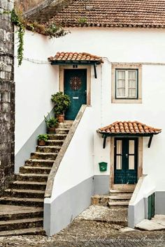 a white building with steps leading up to it