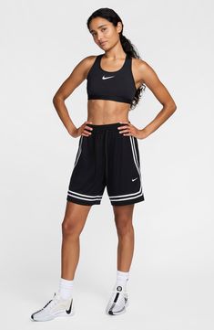 A wider fit through the legs and hips offers more room to move up and down the court in these sweat-wicking basketball shorts framed with contrast stripes. Elastic/drawstring waist Side-seam pockets Dri-FIT moisture-wicking technology 100% polyester Machine wash, dry flat Imported White Aster, Basketball Shorts, The Court, Drawstring Waist, Crossover, Dri Fit, Moisture Wicking, Basketball, Nordstrom