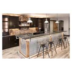 a kitchen with an island and bar stools