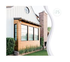 an image of a house with windows and grass