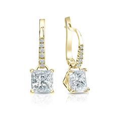 Dangle studs 4-Prong martini set diamond earrings make a stylish statement in beauty. These 18k yellow gold diamond earrings sparkle with a 2.00 ct. princess-cut natural diamonds as center stone and 0.10 ct. total weight of small round diamonds as side stone, together with a total weight of 2.10 ct. in lever back clasps. Princess Cut Earrings, Black Diamond Pendant, Martini Set, Beautiful Diamond Earrings, Yellow Gold Diamond Earrings, Black Diamond Studs, Halo Diamond Earrings, Solitaire Diamond Pendant, Princess Earrings