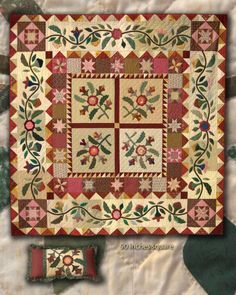 a quilted wall hanging with flowers and leaves on the front, along with two pillows