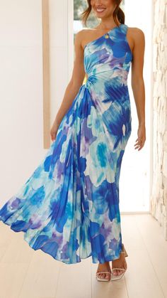 Embrace elegance with this Blue Floral One Shoulder Maxi Dress. Featuring pleated detailing, an adjustable side cutout, and an invisible side zip, it’s perfect for any occasion. Blue Cutout Maxi Dress For Summer, Blue Maxi Length Dress With Cutout, Blue Cutout Maxi Dress, Blue Maxi Dress With Cutout, Blue Maxi Dress With Cutout Details, Blue Summer Dress With Side Slits, Blue Cutout Midi Dress For Summer, Chic Blue Maxi Dress With Cutout, Chic Blue Cutout Maxi Dress