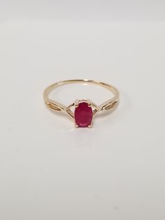 "Thanks for shopping our vintage estate store. We tend to sell well below wholesale and truly hope you enjoy all of our items. Many of the items are one of a kind, so please enjoy scrolling through the pictures and hopefully something will catch your eye. Estate 14k yellow gold natural red 1/2ct ruby birthstone or graduation ring. It's sweet. Just stunning ring. Ring size: 4.5 Setting: 6mm 1/4\" by 4mm Band width: 1mm Weight: 1.07 grams Carat: 1/2 Stunning ring, one that you will love. Marked 14k." Graduation Ring, Graduation Rings, Slide Bracelet, Ruby Birthstone, Gold Halo, Band Engagement Ring, Engagement Bands, Oval Stone, Red Ruby