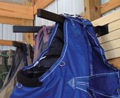 a blue bag sitting on top of a wooden bench