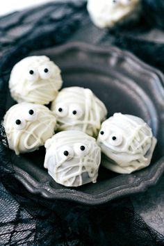 white chocolate covered in icing with eyes on them