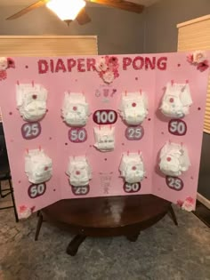 a sign with diapers on it that says diaper pong