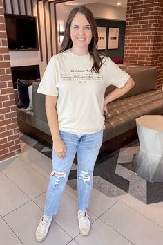 Downtown Plano Est. 1873! This cute sand neutral top shows your love to Downtown Plano! Building shown are Coco Beach to Jett Petts Buildings! Hand Drawn details of Downtown Plano as they are in 2023! Top is round neckline and unisex sizes! Neutral Tops, Tee Outfit, New Outfits