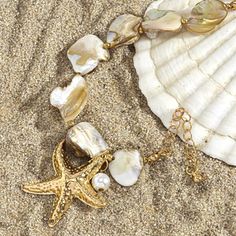 Boho Exquisite Gold Starfish Charm Bracelet - Summer Beach Fashion Jewelry for Women Elevate your summer style with the Boho Exquisite Gold Starfish Charm Bracelet. This elegant piece features a charming gold starfish pendant, embodying the essence of beach fashion and boho chic. Crafted with attention to detail, this bracelet combines classic elegance with a playful summer vibe. Its gold color adds a touch of sophistication, while the starfish charm evokes a sense of coastal adventure. Perfect Gold Starfish Charm Necklace For Beach Season, Beach Jewelry With Adjustable Star Charm, Beach Adjustable Jewelry With Star Charm, Adjustable Beach Jewelry With Star Charm, Gold Necklace With Starfish Charm For Beach Season, Adjustable Star Charm Jewelry For Beach, Gold Charm Bracelet With Lobster Clasp For Beach, Adjustable Gold Charm Bracelet For The Beach, Bohemian Style Bracelet With Starfish Charm