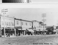 an old black and white photo of some buildings