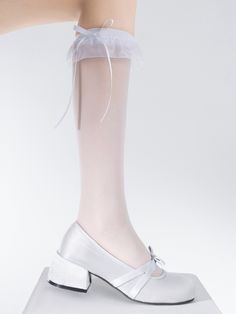 Add a touch of sweetness to your summer outfit with these semi-sheer bowknot stockings. Available in both white and black, these delicate stockings are perfect for adding a charming and kawaii touch to your look.  Each package includes a pair of these adorable socks, making them the perfect accessory for any summer ensemble. White Party Stockings For Spring, White Hosiery For Spring Party, White Hosiery For Party In Spring, White Party Hosiery For Spring, Elegant White Hosiery For Spring, White Stockings For Party In Summer, Fitted Legwear With Bow For Party, White Knee-high Party Legwear, White Summer Party Stockings