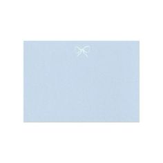 a blue card with a white bow on it