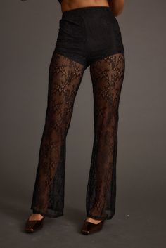 Look lovely in lace in the Happy Hour Black Lace Flare Pant. Inspired by the best selling Midnight Hour Velvet Burnout Flare Pants, we've created a new flare pant in lace with the same sexy sheer look you love. Made with brief shorts, you can wear the Midnight Hour with your favorite going out tops and oversized blazers. Fitted Bottoms With Lace Trim For Evening, Lace Flare Pants For Party, Fitted Lace Trim Bottoms For Evening, Black Bottoms With Lace Trim For Night Out, Flare Lace Bottoms For Party, Lace Flare Bottoms For Party, Black Lace High Waist Bottoms, Chic Lace Bottoms For Evening, Party Bottoms With Lace Trim And Stretch