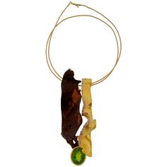 This unusual pendant is a perfect example of top craftsmanship and design, a contrast combination of rough rusted metal and classic yellow gold accented with an approximately 10-carat oval peridot and round diamonds. The pendant is hanging on a very thin yellow gold cord, which also creates a tasteful contract with the bold pendant. Thierry Vendome's designs are very distinctive and unique. Every piece is 100% hand-made and made only once. You will be the only one in the entire world wearing thi Sleek Jewelry, Vendome Jewelry, Pendant Necklace Diamond, Jewelry Casket, Raw Crystal Jewelry, Rusted Metal, Jewelry Style, Decorative Metal, Yellow Gold Pendants