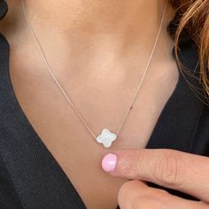 ✔️ Sterling silver 925 & mother of pearl gemstone ✔️ A Dainty Cross Necklace you will love!! ✝️ >>Handcrafted with love for you in GREECE!! >> MATERIAL This crucifix necklace is handmade with sterling Siver 925 Available with 22K Gold finish or rose gold finish >>SIZE Mother of pearl Cross: width >> 0.4 inches - 1.1 cm height >> 0.4 inches - 1.1 cm Chain: Chain length available options : 13-14-15 -16-17-18-19 inches (30-32-35-38-40 -42-45-48 -50 cm ) plus 1 inch Minimalist Sterling Silver Flower Pendant Necklace, White Sterling Silver Necklace As Gift For Her, White Dainty Necklace With Adjustable Chain, Dainty White Necklace With Adjustable Chain, White Necklace With Delicate Chain For Her, White Minimalist Charm Necklace With Round Pendant, White Necklace With Adjustable Chain As Gift For Her, Minimalist White Charm Necklace With Delicate Chain, White Modern Necklace With Adjustable Chain