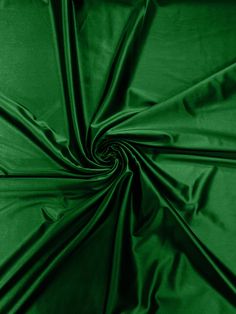 an image of a green fabric background