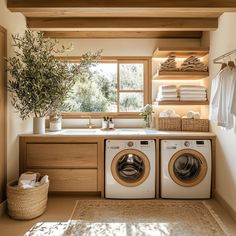 a washer and dryer in a small room with wooden shelves on the wall