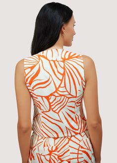 Introducing our Salt To The Sea Vest Top - a fun, feminine addition to your summer wardrobe. Made with a breathable cotton blend fabric, this abstract palm print top will keep you cool and stylish all season long. Perfect for hot days and chic nights. WTWH02858 Imported Lined Self: 70% Cotton 30% Linen Lining: 100% Rayon Model is 5 ft 9.5 inches; Bust: 32", Waist: 24", Hips: 34" and wearing a size Small Runs true to size Hand wash or wash with gentle cycle with cold water with like colors, Air d Patterned V-neck Tops For Vacation, Spring Bold Print Orange Tops, Fitted Abstract Print Summer Tops, Tropical V-neck Top For Summer, Chic Summer Tops With Abstract Print, Sleeveless Graphic Print Vacation Tops, Sleeveless Graphic Print Top For Vacation, Summer Patterned Crew Neck Tops, Spring Cotton Tops With Abstract Print