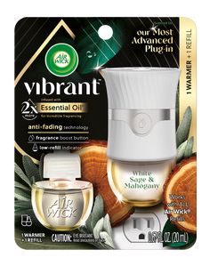 an air wick product is shown in front of a card with the words, vbrant essential oil