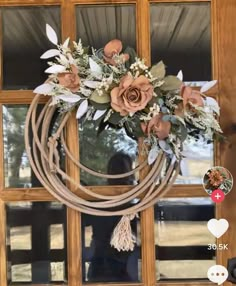 an image of a wreath with flowers on it