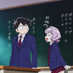 two anime characters standing in front of a chalkboard