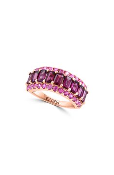 Elevate your outfit with a statement ring featuring rows of sparkling rhodolite garnet and pink sapphire stones set in fine 14k-gold. 14k-rose gold/rhodolite/pink sapphire Made in the USA Rhodolite Garnet Ring, Elevate Your Outfit, Sapphire Stones, Pink Sapphire Ring, Rhodolite Garnet, Pink Ring, Sapphire Stone, Garnet Rings, Wedding Bells