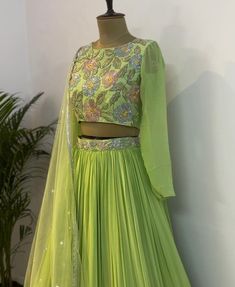 lehenga set |womens lehenga choli |crop top lehenga set |designer lehenga dupatta | wedding lehenga choli | green and blue  shade lehenga usa Women's lehenga set /green blue  silk skirt/voggish / organza designer lehenga with dupatta       lehengas are one of the beautiful and versatile traditional attires of india !! we carry such pieces in budget with great quality that can be styled in multiple ways with different outfits !!       Here is Beautiful lehengas sets in blue and green in which chinnon skirt paired with matching pure raw silk hand embroidered crop top and matching soft net dupatta with lace finish as shown!! Skirt has heavy gear and both pieces can be mix and matched with different outfits !! Ready to ship All over the world !! can be customized in colors and patterns !! deta Blue Crop Top Lehenga, Beautiful Lehengas, Mehendi Lehenga, Lehenga Green, Skirt Lehenga, Top Lehenga, Heavy Gear, Usa Wedding, Crop Top Lehenga