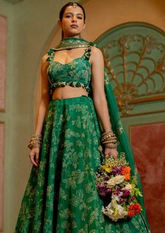 Featuring self woven Russian jacquard lehenga set paired with blouse and tissue base dupatta with antique gold resham and embellished hand work. Emerald Green Lehenga, Simple Lehenga Designs, Mendhi Outfit, Jacquard Lehenga, Paulmi And Harsh, Fashion Course, Lehenga And Blouse, Gold Lehenga, Lehenga Design