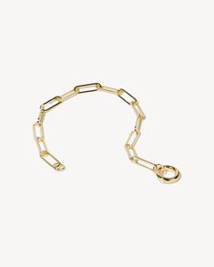 This paperclip chain bracelet looks perfectly stacked alongside other gold bracelets.- Color: Gold- Metal: 14K Gold-plated unique metal blend- Hypoallergenic- Handcrafted- Imported Gold-plated Paperclip Chain Bracelet With Oval Links, Elegant Gold-tone Oval Link Paperclip Bracelet, Gold-tone Oval Link Gold Plated Bracelet, Gold-tone 14k Gold Oval Link Paperclip Bracelet, Gold-colored Brass Oval Link Bracelet, Eco Friendly Wrapping, Los Angeles Design, Sell Gold, Paper Clip