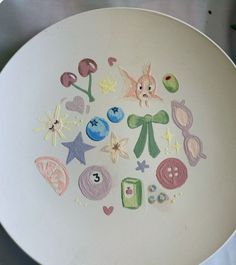 a white plate with some drawings on it