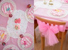 the table is decorated with pink and white plates, napkins, and bows on it