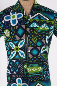 "vintage 1960s mod mens green blue HAWAII shirt mid century modern hawaiian tiki hippie summer spring sz M Near mint condition, no serious flaws to note. Tagged M Chest: 40\" Shoulder: 18\" Length: 28\" All sales are final, please ask questions before purchasing. Size medium" Green Hawaiian Shirt With Graphic Print, Vintage Green Camp Shirt For The Beach, Vintage Green Camp Shirt For Beach, Retro Green Camp Shirt With Graphic Print, Retro Green Hawaiian Shirt With Graphic Print, Fitted Retro Hawaiian Shirt For Vacation, Retro Green Hawaiian Shirt For Vacation, Retro Green Printed Hawaiian Shirt, Retro Fitted Hawaiian Shirt For The Beach