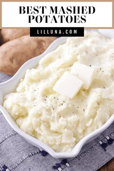 mashed potatoes in a white bowl with butter on top