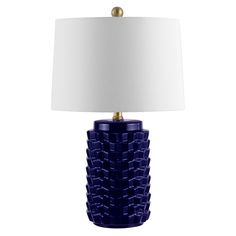 a blue table lamp with a white shade