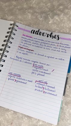 an open notebook with the words adveries written on it