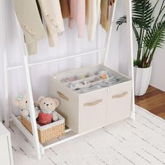 an organized closet with clothes and toys