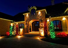 a house with christmas lights on the front and side