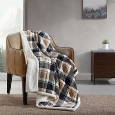 a chair with a blanket on top of it