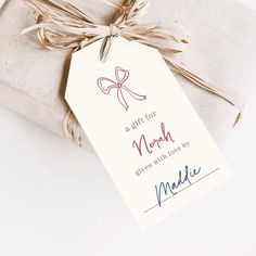 a gift for mom is wrapped in brown paper and tied with twine on top